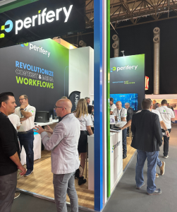 People talking at the Perifery stand at IBC 2023