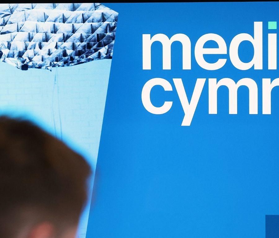 Picture of a TV screen with Media Cymru logo