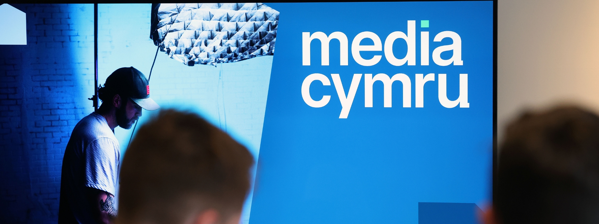 Picture of a TV screen with Media Cymru logo