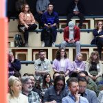 an audience sitting in a lecture theatre