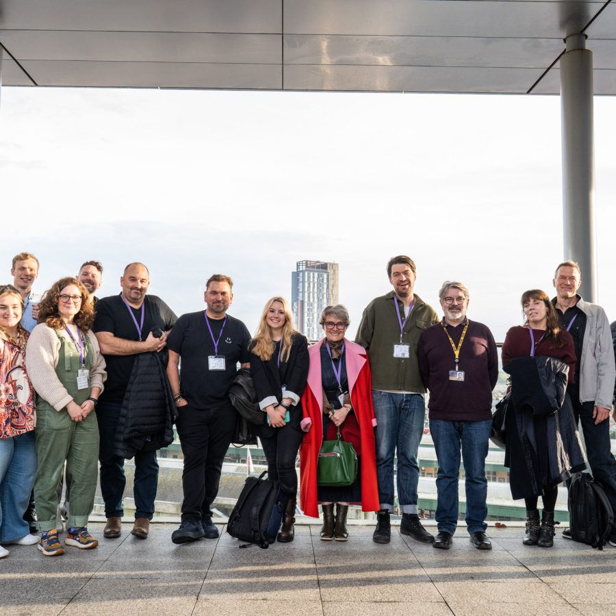 group of people standing together posing for a photo